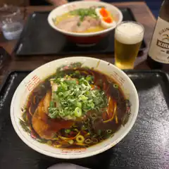 Bowl of ramen with beer