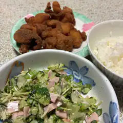 Fried chicken, rice, and salad