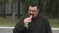 Steven Seagal eating a carrot