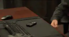Ron Swanson smashes phone with hammer