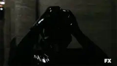 Evan Peters as Quicksilver in black suit