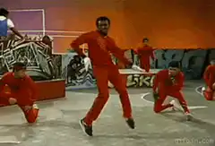 Man in red suit dancing