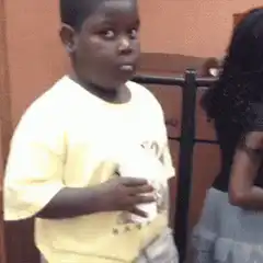 Young boy looking confused