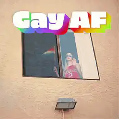 Gay AF woman waving rainbow flag