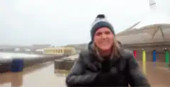 Woman gets hit by a wave
