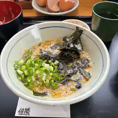 Bowl of ramen with seaweed and green onions