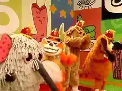 The Wiggles dancing on stage