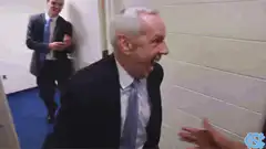 Dean Smith gets mobbed by UNC basketball team