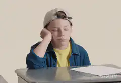 Boy falling asleep at desk