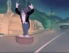 Tom on a skateboard gets hit by a bus