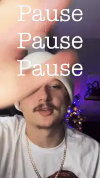 Guy waving hand in front of face with Pause text