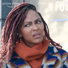 Woman rolls eyes and looks skeptical