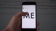 Hand tapping ME on phone screen