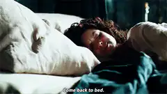 Woman in bed says come back to bed