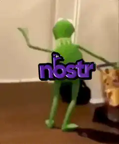 green alien dancing with nostr logo
