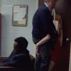 man sitting on another man's lap