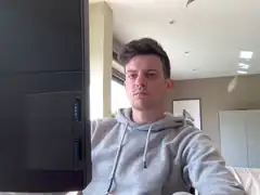 man holding monitor sideways