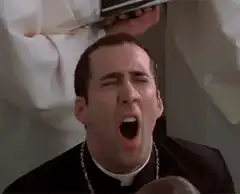 Nicolas Cage screaming priest