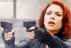 Black Widow aiming dual pistols