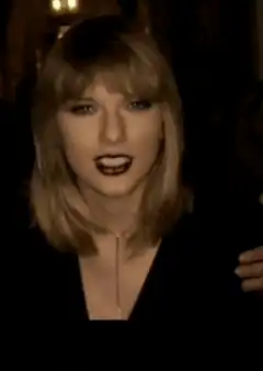 Taylor Swift talking and smiling