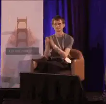 Man clapping hands on stage