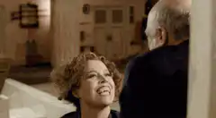 Woman laughs maniacally at man