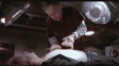 Dr. Chilton removes a patient's heart