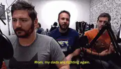 Three men podcasting with caption