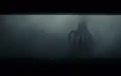 Hand and smoke forming a ring