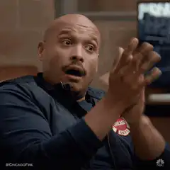 Chicago Fire man clapping shocked face