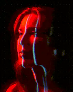 Woman face with red and blue light streaks