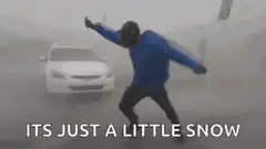 Man dancing in heavy snow