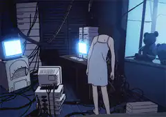 Girl sits down at computer desk