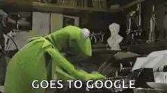 Kermit the Frog typing on a typewriter