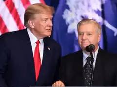 Donald Trump kisses Steve Bannon