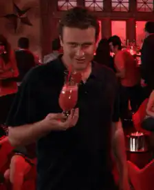 Ted Mosby holding a pink drink