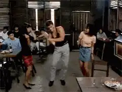 Arnold Schwarzenegger dancing in a bar