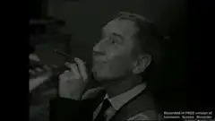 Man smoking pipe looking up