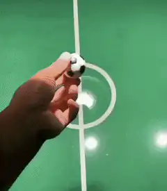 Toy fish play soccer
