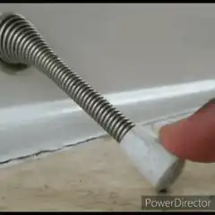 Handheld shower hose retracting