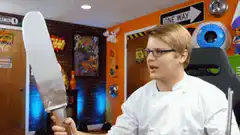 man holding large knife