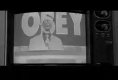 Obey Big Brother skeleton then Michael Douglas smile