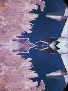 Kaleidoscope of a jet and mountains