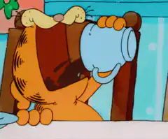 Garfield drinking from a mug