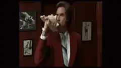 Richard Nixon blowing a conch shell
