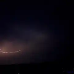 massive lightning strike over water