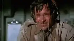 Man sweating profusely in cockpit
