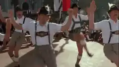 Men in lederhosen dancing