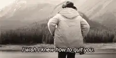 Man in parka looking at mountains