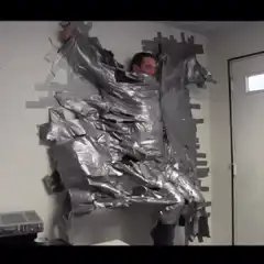 Man breaks through foil wall
